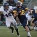 Ann Arbor Pioneer junior Thad Stalmack chases down Saline sophomore running back Kevin Gross on Friday. Pioneer won 7-6. Daniel Brenner I AnnArbor.com